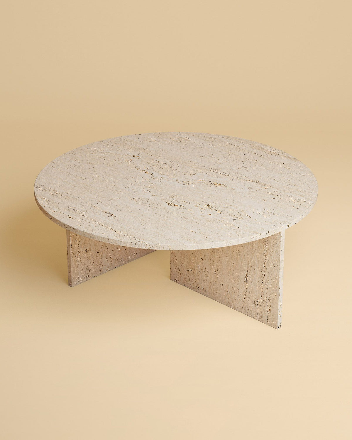 ishiki coffee table by lebanto, roman travertine, from above