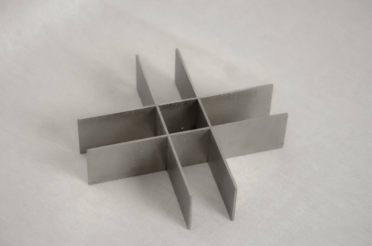 stainless steel candle holder — Dot Objects · collectible design at spazio