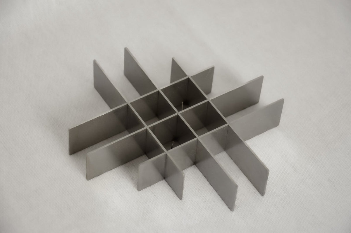 stainless steel candle holder — Dot Objects · collectible design at spazio
