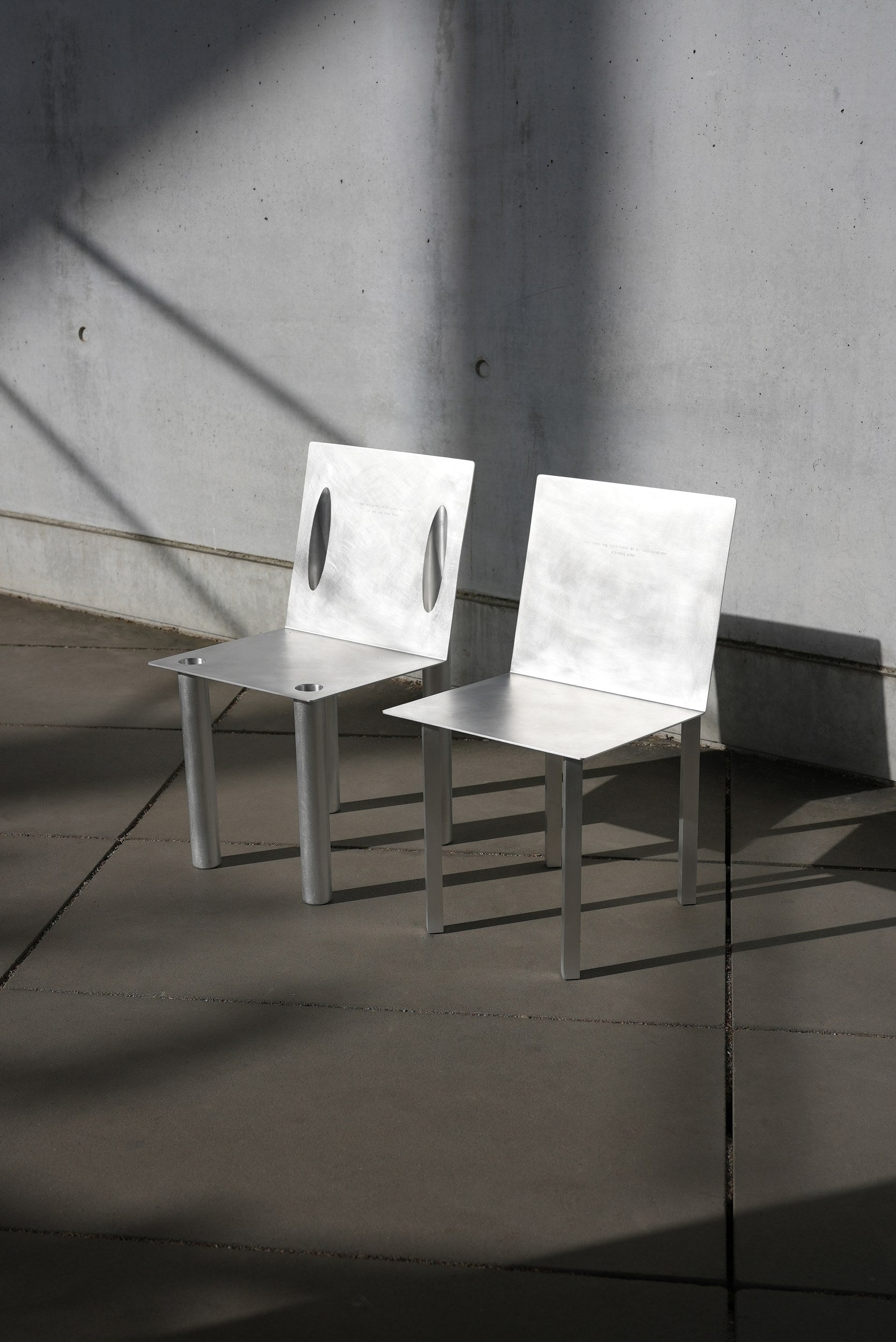 master & margarita 2-in-1 chair — the pair on a concrete terrace · studio von schoenebeck · collectible design at spazio