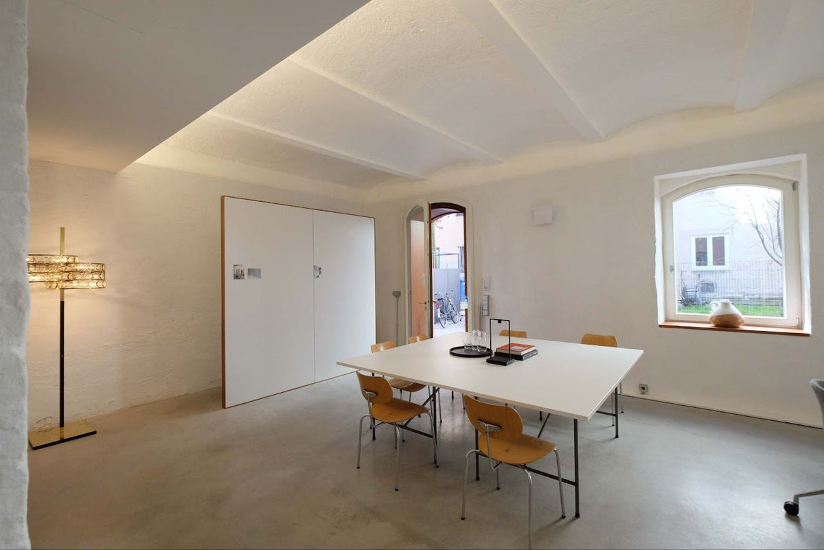 spazio, Aventinstraße — the white showroom with the long table