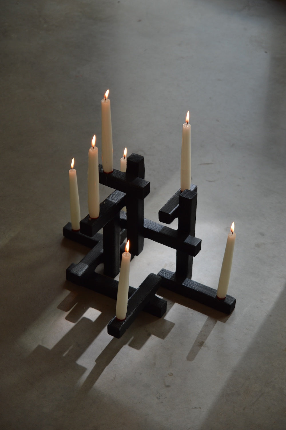 tetris candle holder, size 7 — seven lit tapers · studio von schoenebeck · collectible design at spazio