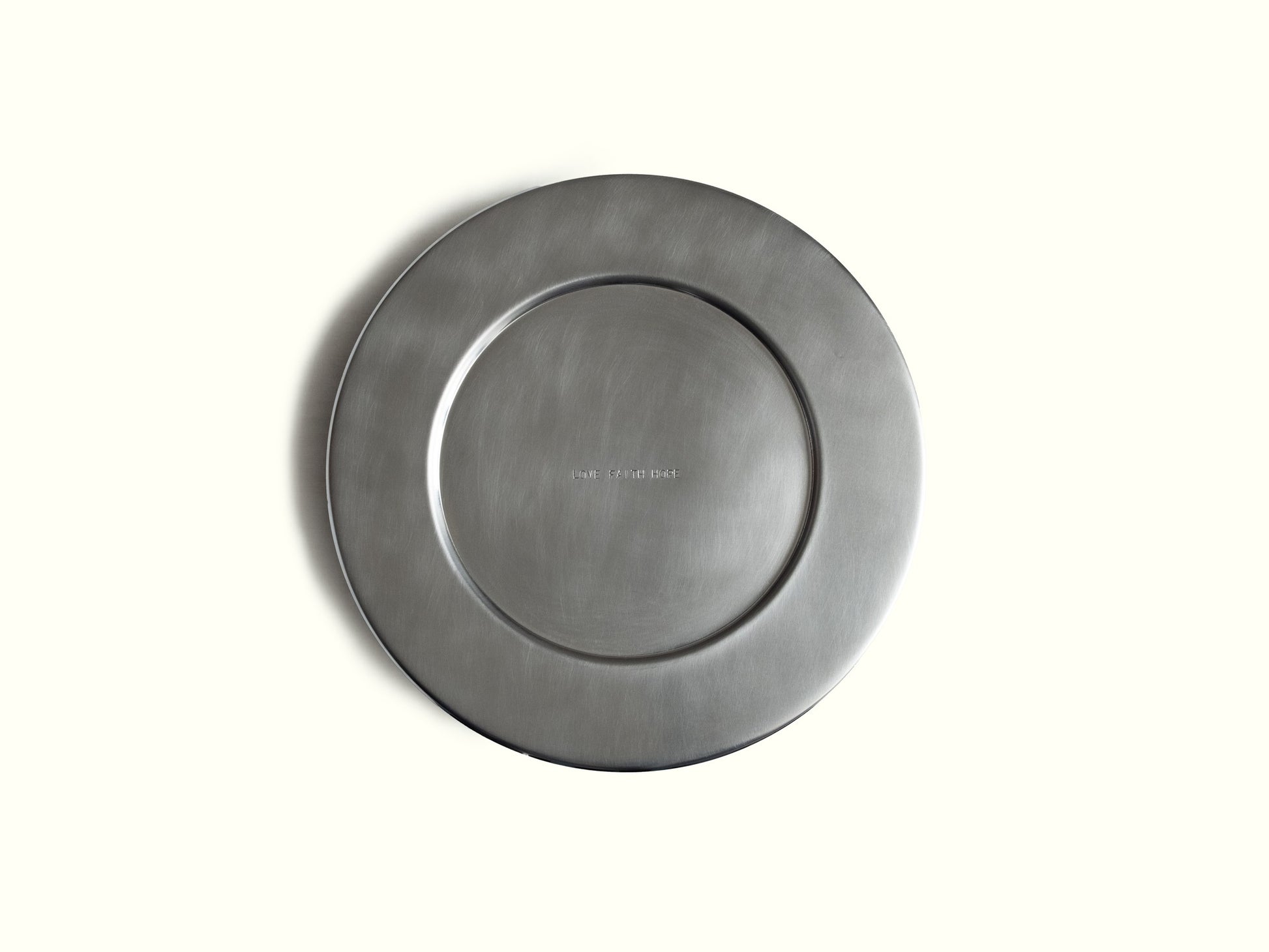 traces charging plate 'love faith hope' — brushed aluminium · studio von schoenebeck · collectible design at spazio