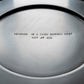 traces charging plate 'revenge' — engraving detail on dark ground · studio von schoenebeck · collectible design at spazio