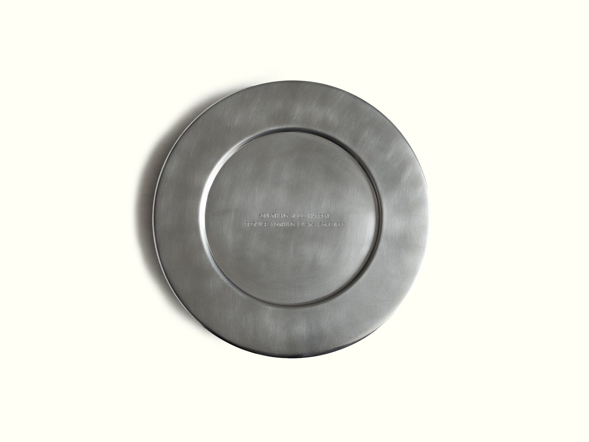 traces charging plate 'something will happen because nothing lasts forever' — brushed aluminium · studio von schoenebeck · collectible design at spazio